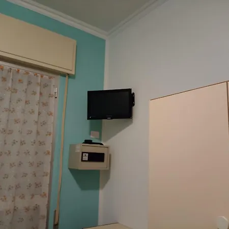 Отель Toschi *